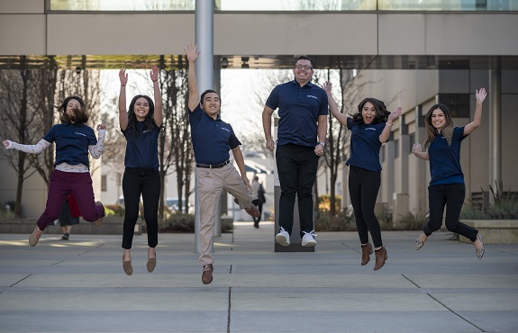 UC Davis Medical Center staff jump for joy.