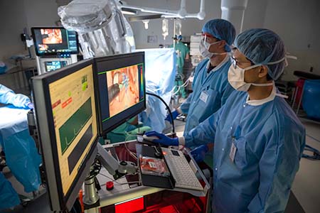 UC Davis surgery team operating on a head and neck cancer patient