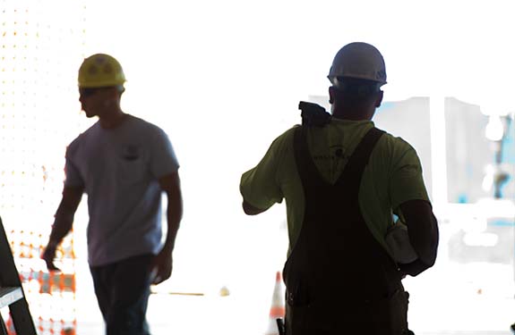 Stock image of construction workers
