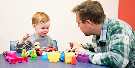 Parent and child playing during PC-CARE session.