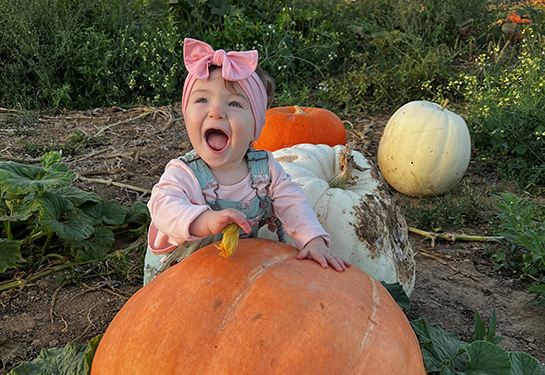 Scarlett at the pumpkin patch this year
