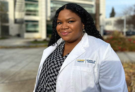 Portrait of medical student Chelsea Nash wearing white lab coat