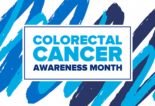 Blue and white sign with the words Colorectal Cancer Awareness Month