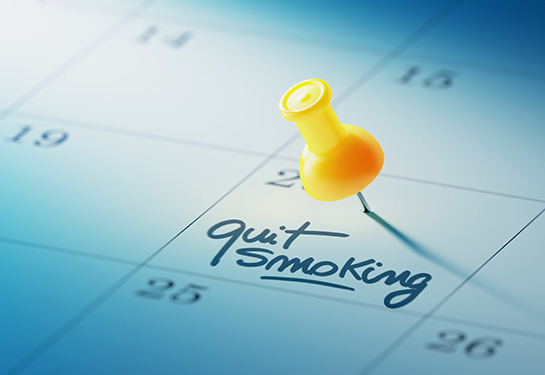 A yellow pushpin marks the date to quit smoking