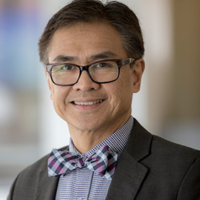 Asian American man with bow tie