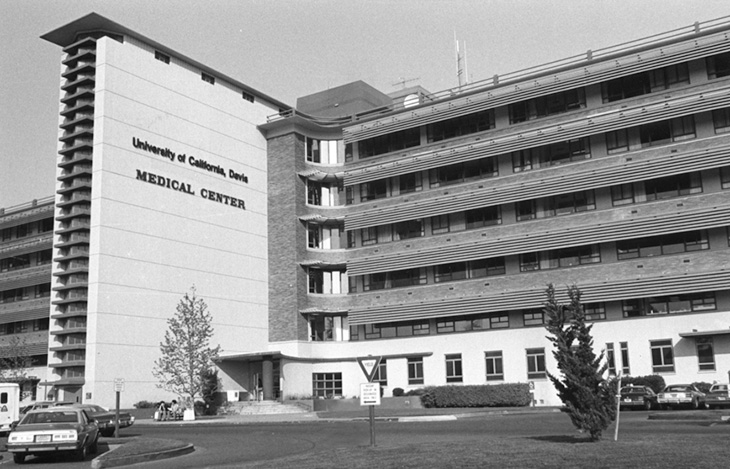 Black and white photo of building that says University of California, Davis Medical Center.