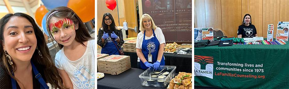 Left: A woman with long, dark brown hair smiles widely next to a young girl whose face has been painted with red and green stripes and a heart. Center: Two women wearing blue aprons stand between two long black tables filled with cardboard pizza boxes, croissant sandwiches, a crate of oranges and condiments. Right: A woman wearing a black T-shirt sits in front of a large wooden pillar and behind a table with a green tablecloth.