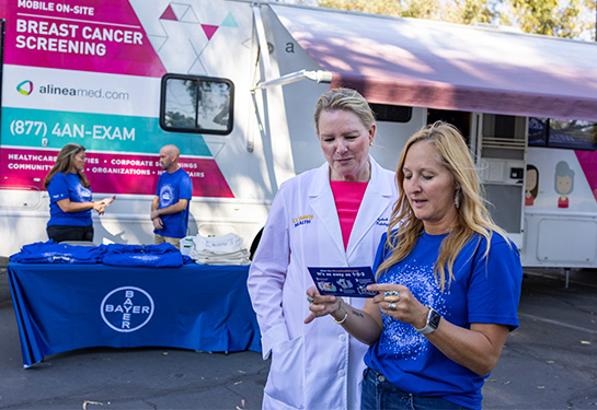 mammovan w/ Dr. Morris and Bayer rep in foreground
