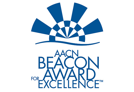 A white square with blue image and lettering that states &#x201c;AACN Beacon Award for Excellence&#x201d;