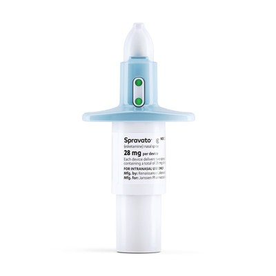 A blue and white nasal spray container with the word Spravato® against a white background.