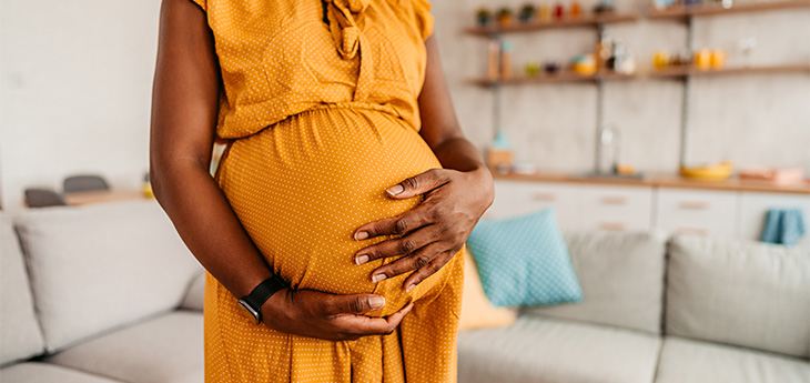 Black woman enjoying pregnancy at home
