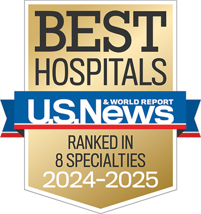 A gold, red and blue “Best Hospitals” badge from U.S. News and World Report