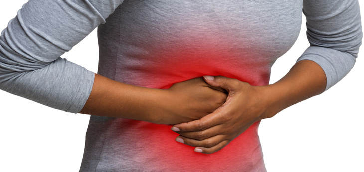 A woman holds on to her stomach which is accentuated with a red zone that indicates pain in the abdominal cavity.