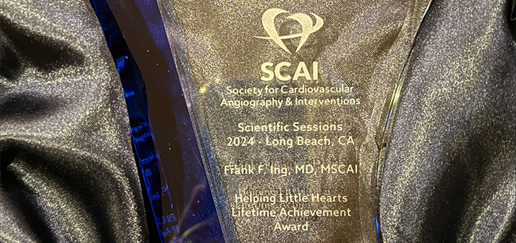 Glass award with Frank Ing’s name etched