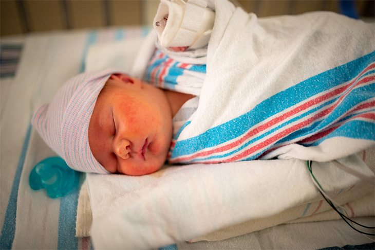 Baby in a hospital bed