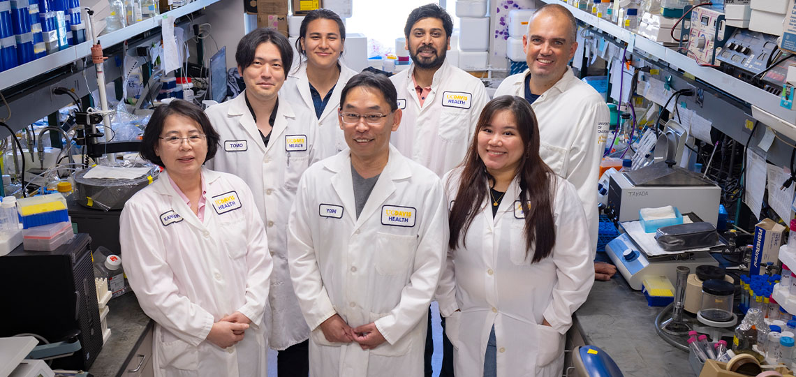 Group of people standing in a lab