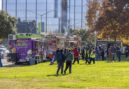 Staff lined up at food trucks