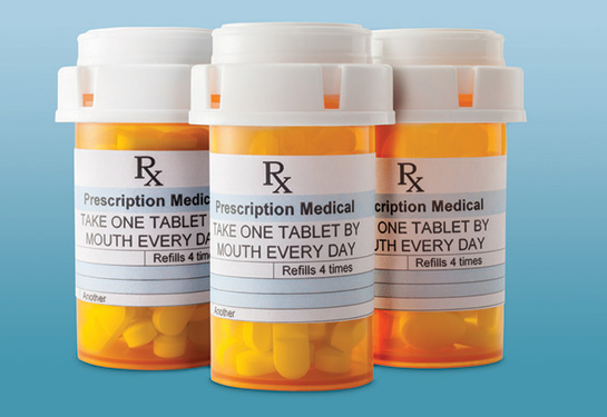 Three prescription bottles with a sticker on the front that states, &#x201c;Prescription Medical: Take One Tablet by Mouth Every Day.&#x201d;