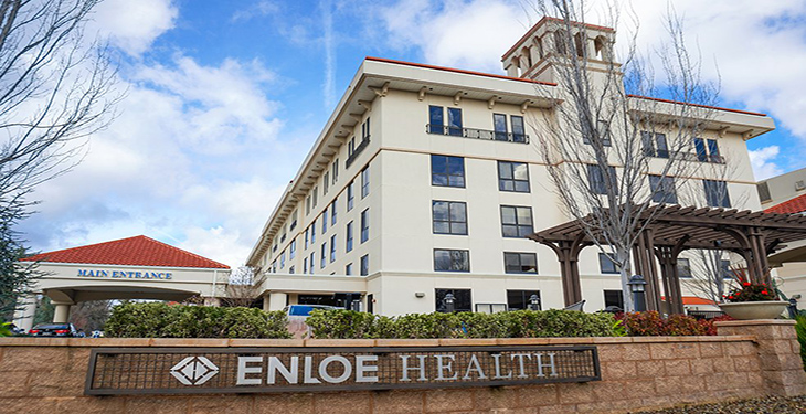 Exterior of building with a sign that reads “Enloe Health”