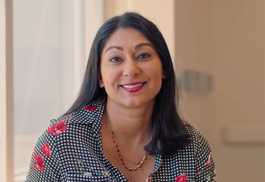 Photo of person with shoulder length black hair