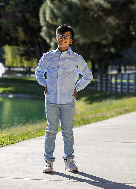 A child stands in the park.