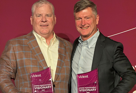 Bruce Hall accepts a Vizient award