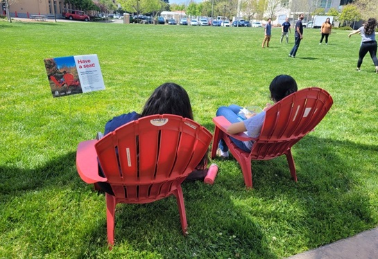Red chairs from the Chair Share Program.