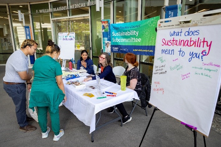 Staff at a sustainability booth