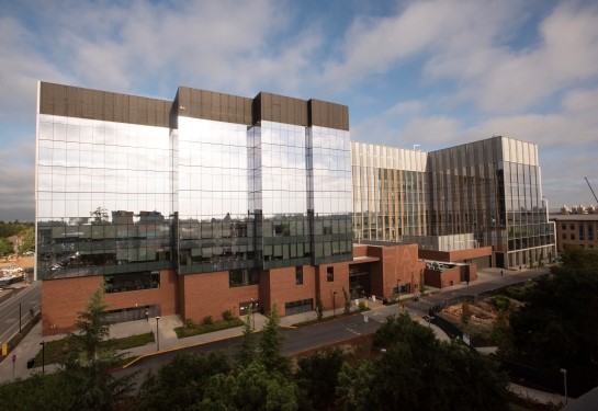 Aggie Square buildings in Sacramento featuring modern glass-and-brick research buildings and walkways.