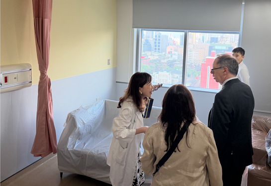 The delegation tours a modern hospital patient room in Taiwan