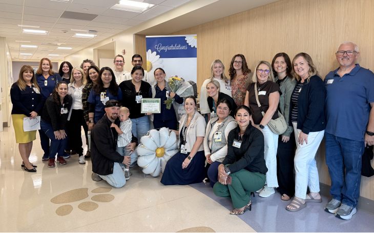 Group of employees celebrating a DAISY Award
