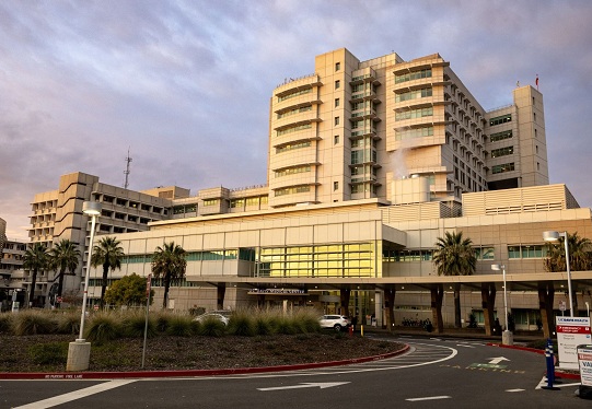 Front exterior of UC Davis Medical Center showing the hospital tower and main entrance.