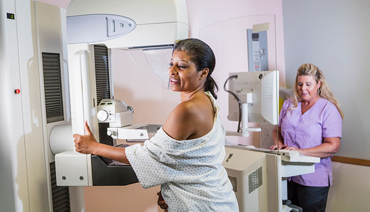 woman getting a mammogram