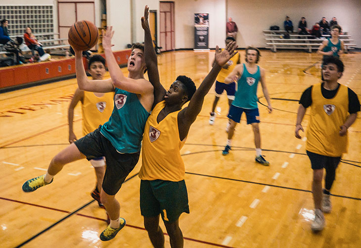 high school basketball players in a game