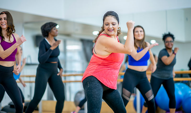 women dancing in a fitness class