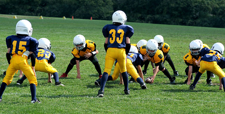 youth football players on a field