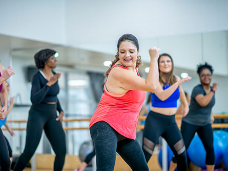 women dancing in a fitness class