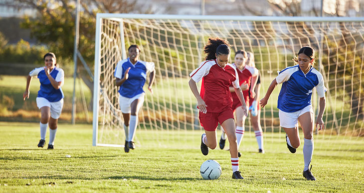 girls playing soccer, tips to prevent soccer injuries