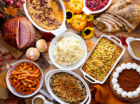 A large Thanksgiving day spread of food