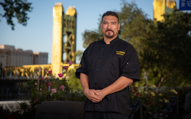 Executive Chef Satana Diaz in front of the Tower Bridge