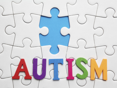 Autism over puzzle pieces
