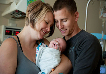 Erin and Nick Ciapponi hold their new son, Guy, after he was treated at UC Davis for persistent pulmonary hypertension of the newborn.