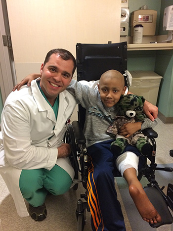 Pediatric orthopaedic patient Jorge Portugal with Dr. Steven Thorpe.