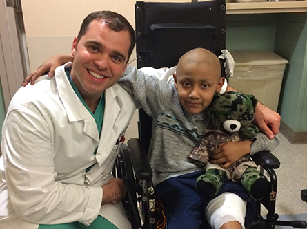 Pediatric orthopaedic patient Jorge Portugal with Dr. Steven Thorpe.
