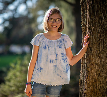 Now almost 12, Emily Love is cancer free and has a passion for drama.