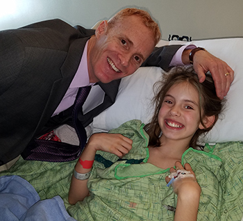 Zoey and Dr. Kurzrock after surgery