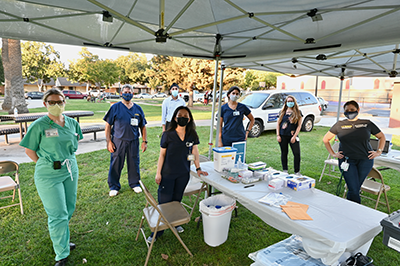 UC Davis Health physicians at a community vaccine clinic