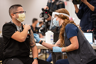 UC Davis Health employee getting COVID-19 vaccine