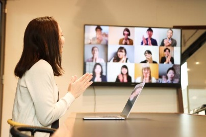 Various people accessing a virtual training on computers