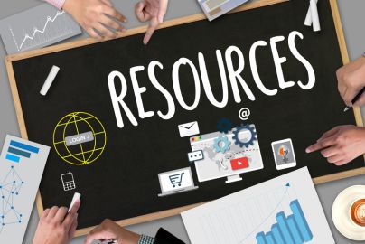 the word "resources" written on a blackboard